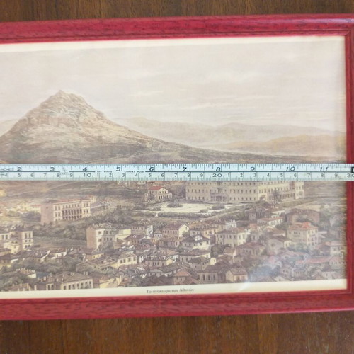 Frames with old photographic views of the Acropolis and the Palaces like new