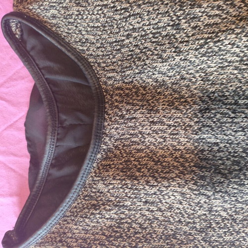 Knitted blouse with transparency used, back detail and leather neck