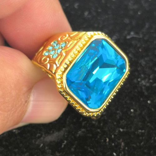 Vintage gold tone men's ring with large blue rectangular stone