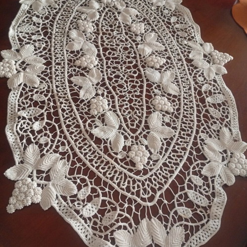 Antique handmade crochet table linen with grape cluster design used
