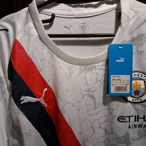 Manchester City away jersey new, size Large