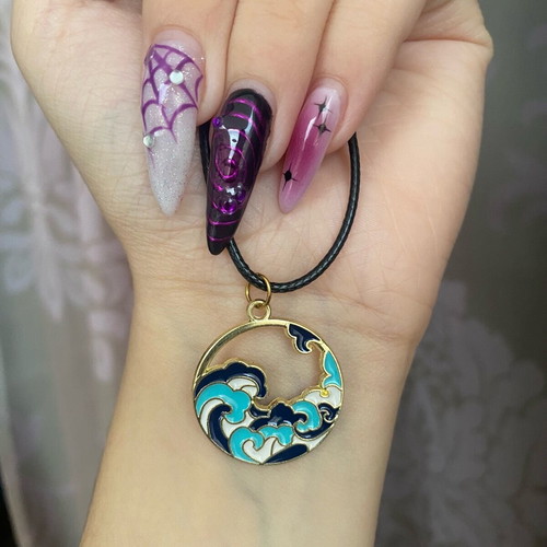 The Wave unisex necklace new with black cord