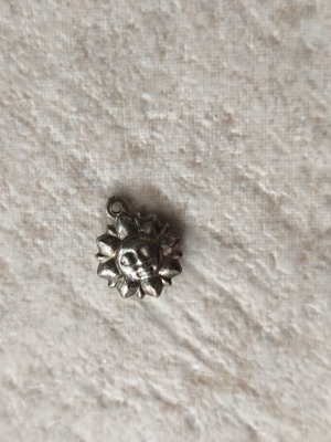 Sun pendant used, silver, without chain