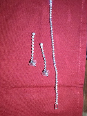 Swarovski tennis bracelet with earrings like new, silver