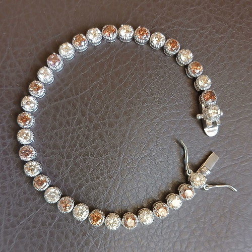 Silver Riviera jewelry set 925 with honey shade zirconia, bracelet and ring