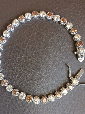Silver Riviera jewelry set 925 with honey shade zirconia, bracelet and ring