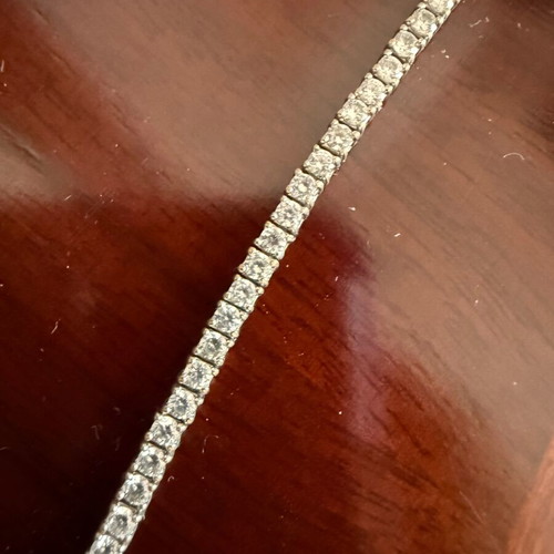 Riviera tennis bracelet used, size 18, silver-plated, gray