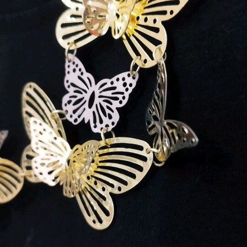 Necklace with butterflies like new in gold and silver