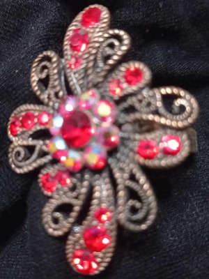 Metal ring with stones