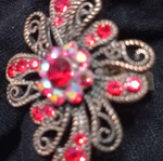 Metal ring with stones