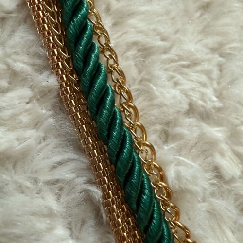 Steel bracelet new with green cord braided design