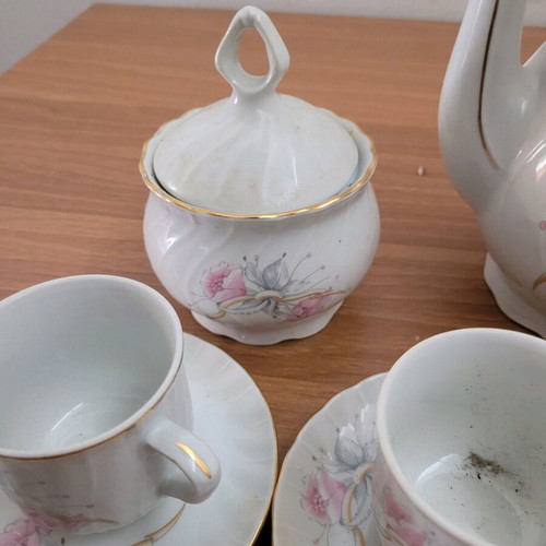 Porcelain tea set used with minor damages