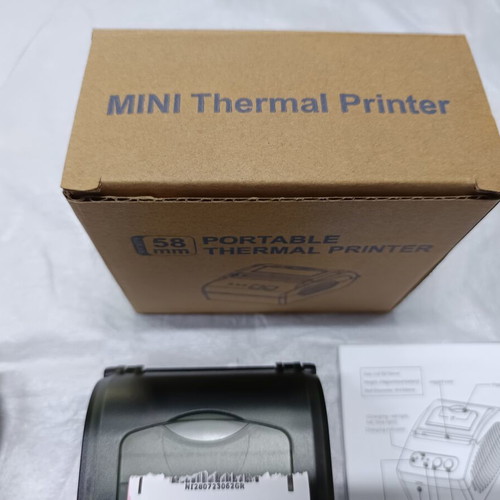 Portable thermal receipt printer