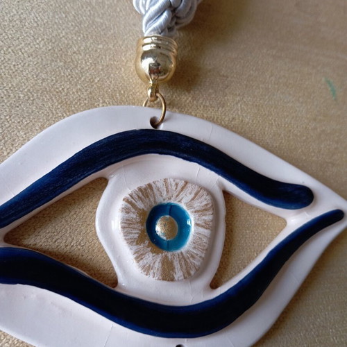 Handmade hanging eye gouri, like new, clay 15x8 cm