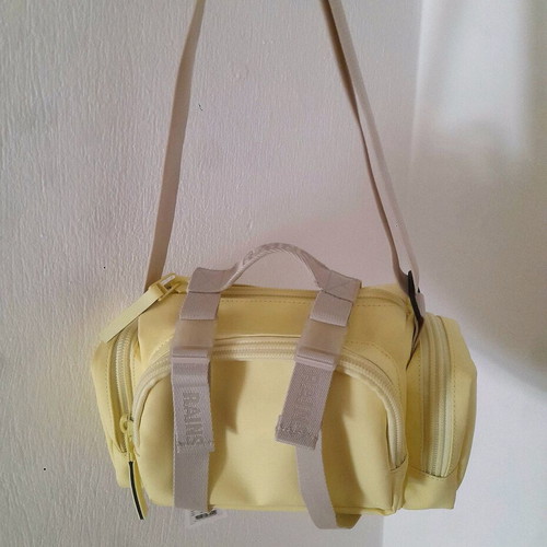 Rains shoulder bag, beige and yellow, waterproof fabric