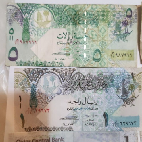 Qatar banknotes 5 pieces, one 5 Riyal and four 1 Riyal, mostly like new