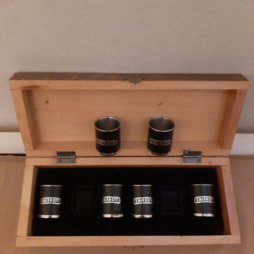 Smirnoff shot glasses collectible set like new with wooden box