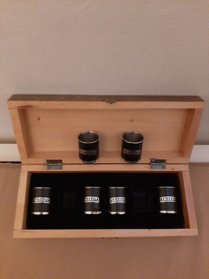 Smirnoff shot glasses collectible set like new with wooden box