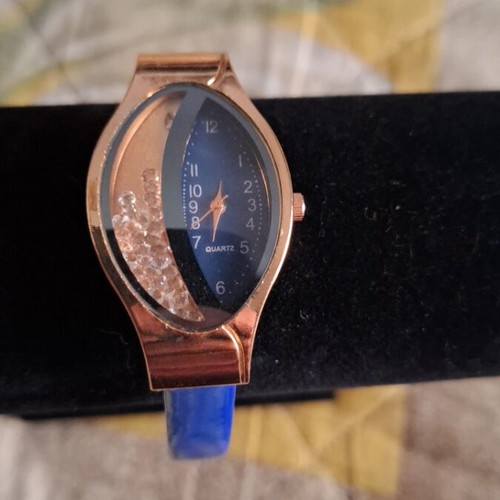 Wristwatch new with modern design in blue color
