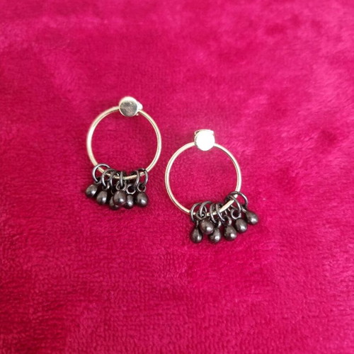 Gold-plated hoop earrings with hanging details like new