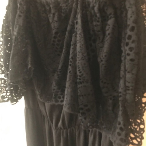 Long black dress with knitted details like new