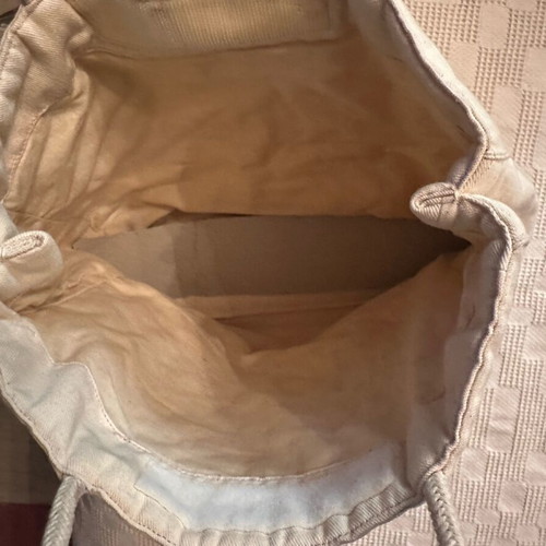 White simple handheld bag used