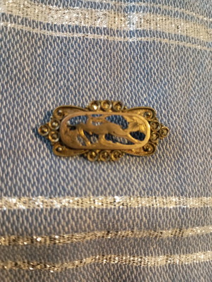 Silver-gold brooch used with Rodian technique and 9k deer motif