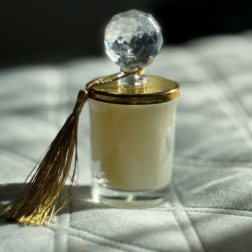 Decorative candle new, slightly melted due to temperature