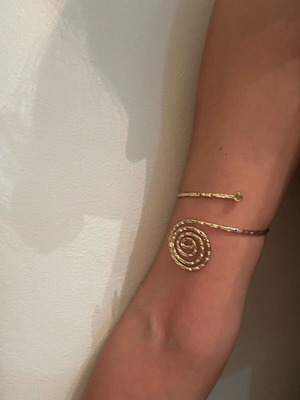 Arm bracelet like new, gold-colored