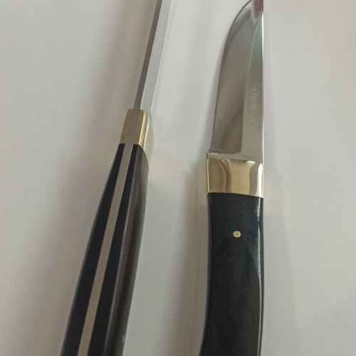 Russian Ohotnik knives new, 65x13 steel, black wood handle