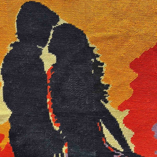 Handmade embroidery used, couple silhouette with sunset