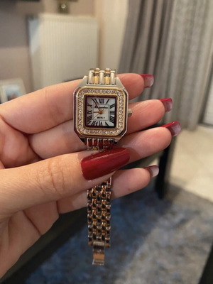 Silver wristwatch with new battery, women's