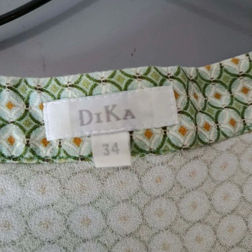 Sleeveless Wrap Top Dika like new, green geometric pattern, size 34