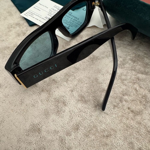 Gucci sunglasses new with acetate frame and light green lens