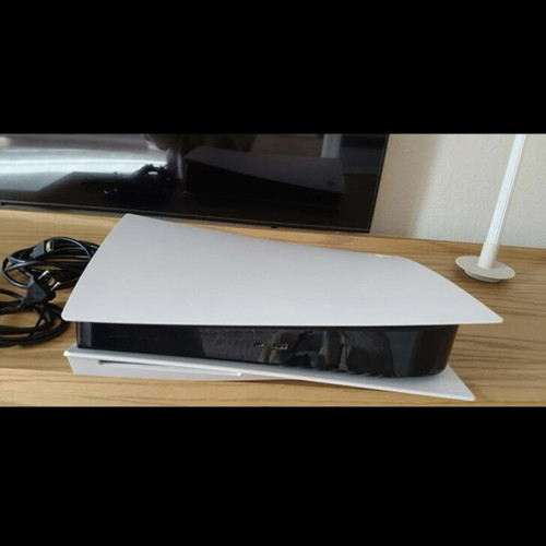 PlayStation 5 like new with 8 games and 2 controllers