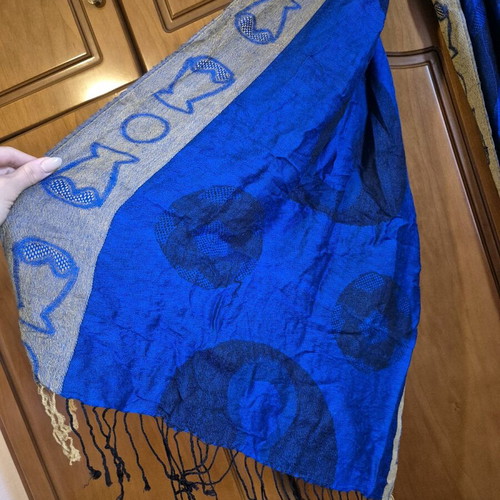 Women's scarf like new in vibrant blue with artistic pattern