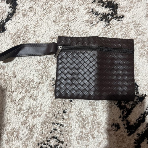 Brown knitted pouch with wrist strap like new