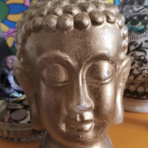 Golden Buddha bust decorative candle like new