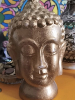 Golden Buddha bust decorative candle like new