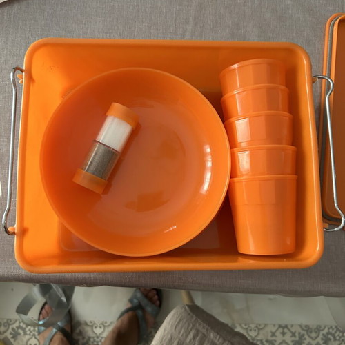 Camping set with 5 shallow plates, 5 deep plates and 5 glasses with salt and pepper