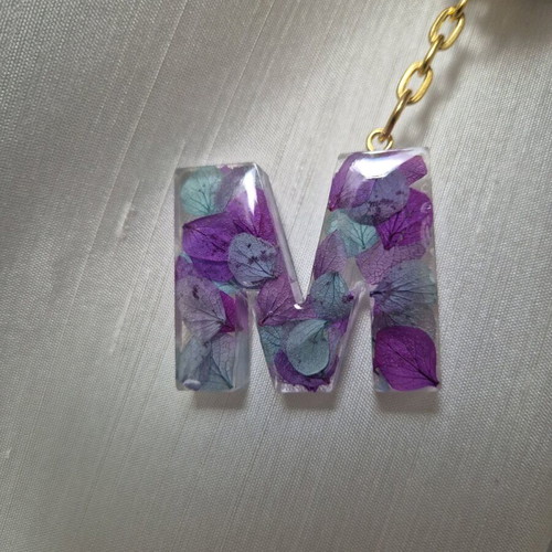 Handmade monogram keychain from resin custom made with purple and turquoise flowers