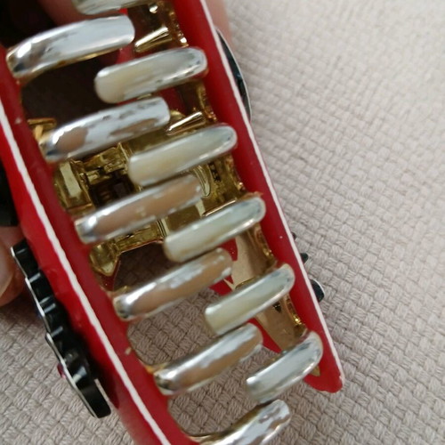 Artstar hair clip red with cat design like new