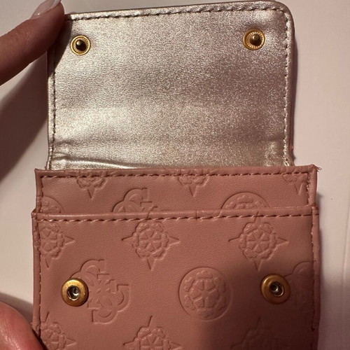 Guess wallet used, small size, pink with many compartments
