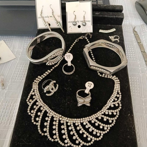 Set of 10 jewelry accessories: necklace, earrings, pendants, bracelets, rings