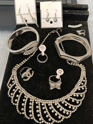 Set of 10 jewelry accessories: necklace, earrings, pendants, bracelets, rings