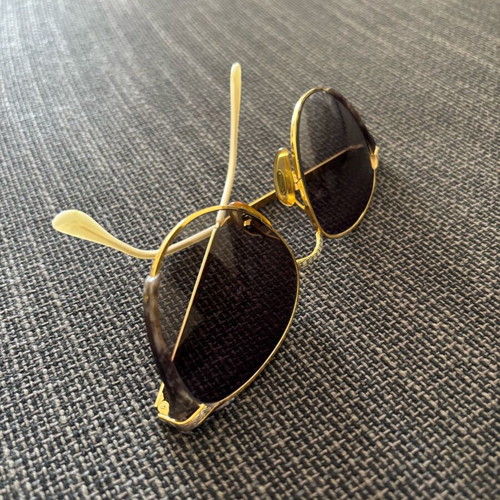 Vogart vintage sunglasses used with gold frame and silver details