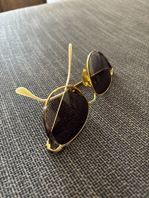 Vogart vintage sunglasses used with gold frame and silver details