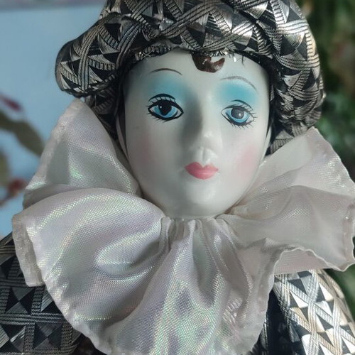 Porcelain Harlequin doll