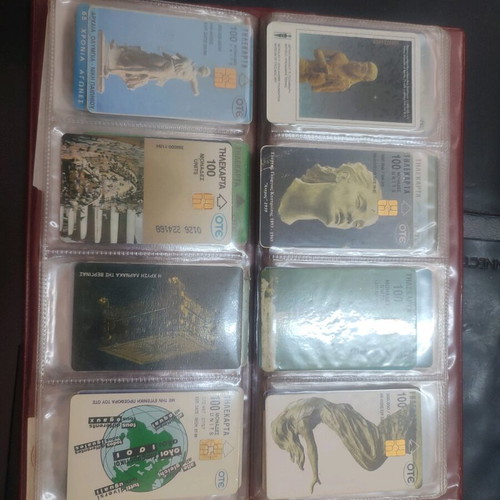 Phone cards used, album with 66 pieces