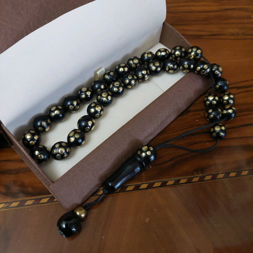 Worry beads with 33 ebony beads and golden copper inlays new